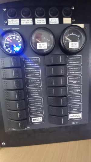 Double Trouble Yacht Photos Pics Control panel of a 2015 Fountaine Pajot Lipari 41 catamaran with gauges and switches.