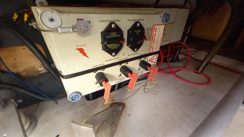 Double Trouble Yacht Photos Pics Electrical panel of a 2015 Fountaine Pajot Lipari 41 catamaran with switches and wiring.