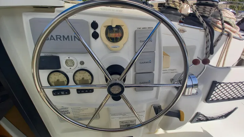 Double Trouble Yacht Photos Pics Steering wheel and controls of 2015 Fountaine Pajot Lipari 41 catamaran.
