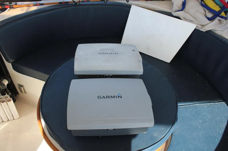 Ocean Eyes Yacht Photos Pics Two Garmin devices on a table inside a 1994 Mikelson 64 yacht.