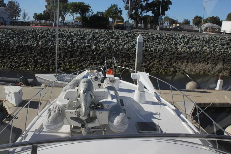Ocean Eyes Yacht Photos Pics Bow view of 1994 Mikelson 64 yacht docked at marina.