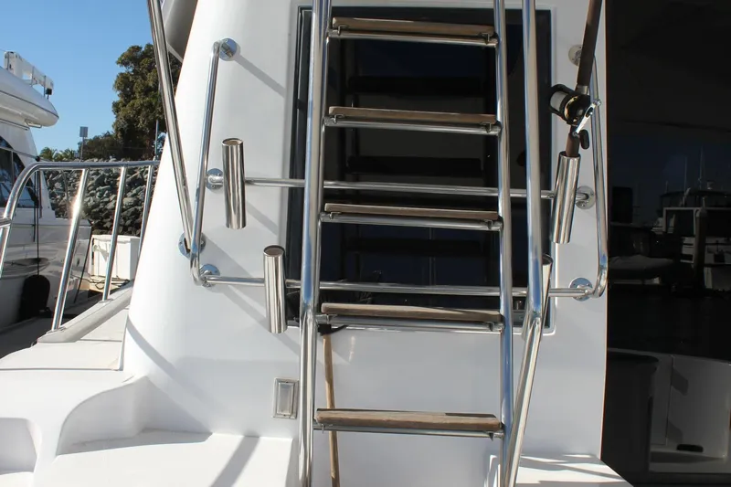 Ocean Eyes Yacht Photos Pics Stainless steel ladder on a 1994 Mikelson 64 yacht deck.