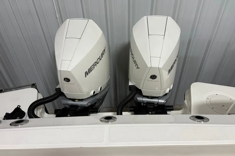 Yacht Photos Pics Twin Mercury outboard engines on a 2022 Boston Whaler 325 Conquest boat.