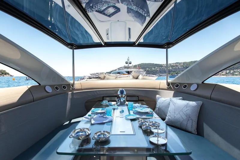Mercedes Yacht Photos Pics Luxurious interior of 2022 Silver Arrows Marine Arrow 460 GT yacht with elegant dining setup.