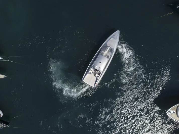 Mercedes Yacht Photos Pics Aerial view of 2022 Silver Arrows Marine Arrow 460 GT yacht navigating in open water.