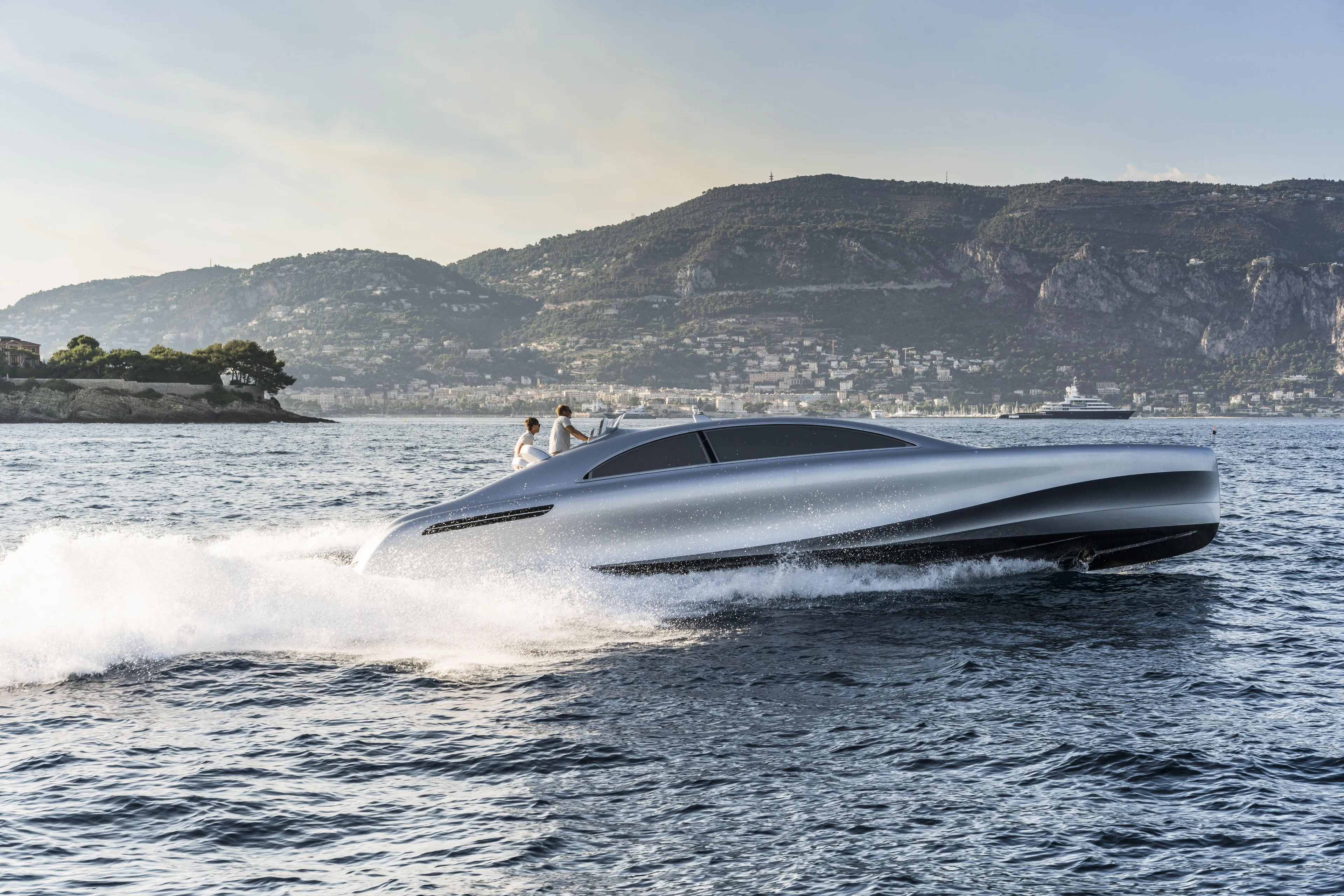 Mercedes Yacht Photos Pics 2022 Silver Arrows Marine Arrow 460 GT yacht cruising on open water with scenic mountain backdrop.