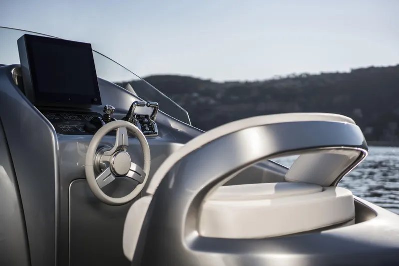 Mercedes Yacht Photos Pics Luxurious helm of 2022 Silver Arrows Marine Arrow 460 GT yacht, featuring sleek design and modern controls.