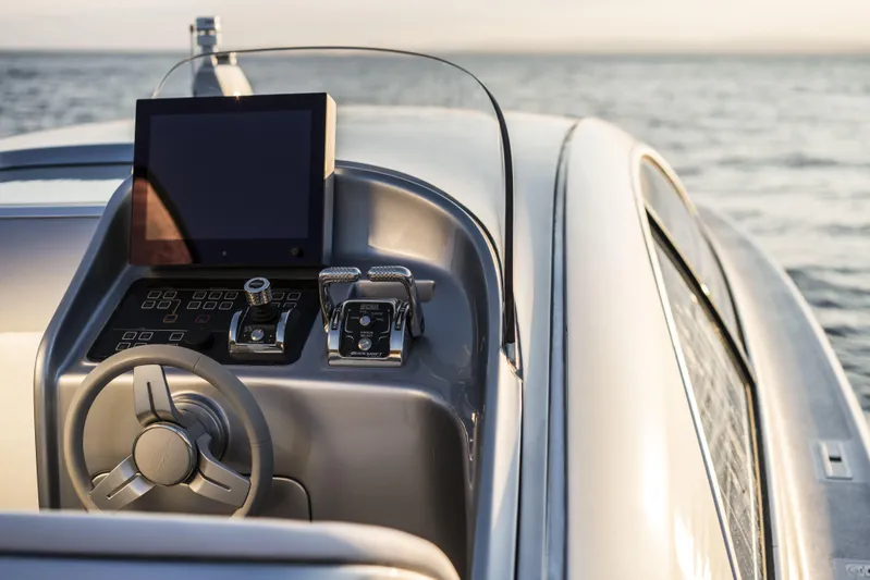 Mercedes Yacht Photos Pics Helm of 2022 Silver Arrows Marine Arrow 460 GT yacht with modern controls and ocean view.