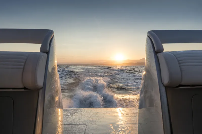 Mercedes Yacht Photos Pics 2022 Silver Arrows Marine Arrow 460 GT yacht cruising at sunset.