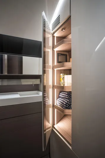 Mercedes Yacht Photos Pics Luxurious interior of 2022 Silver Arrows Marine Arrow 460 GT yacht with illuminated shelving.