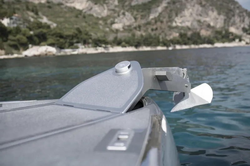 Mercedes Yacht Photos Pics 2022 Silver Arrows Marine Arrow 460 GT yacht anchor detail near scenic coastline.