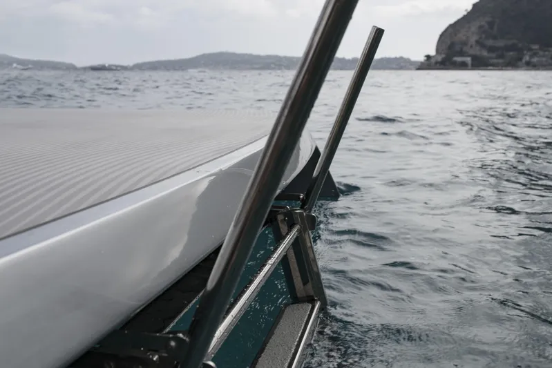 Mercedes Yacht Photos Pics 2022 Silver Arrows Marine Arrow 460 GT yacht on water, sleek design, coastal backdrop.