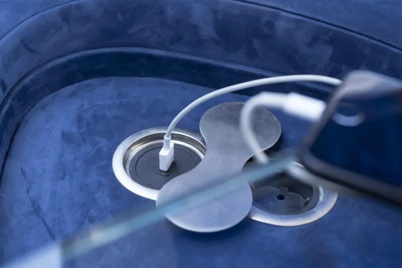 Mercedes Yacht Photos Pics USB charging port on luxurious blue seating of 2022 Silver Arrows Marine Arrow 460 GT yacht.