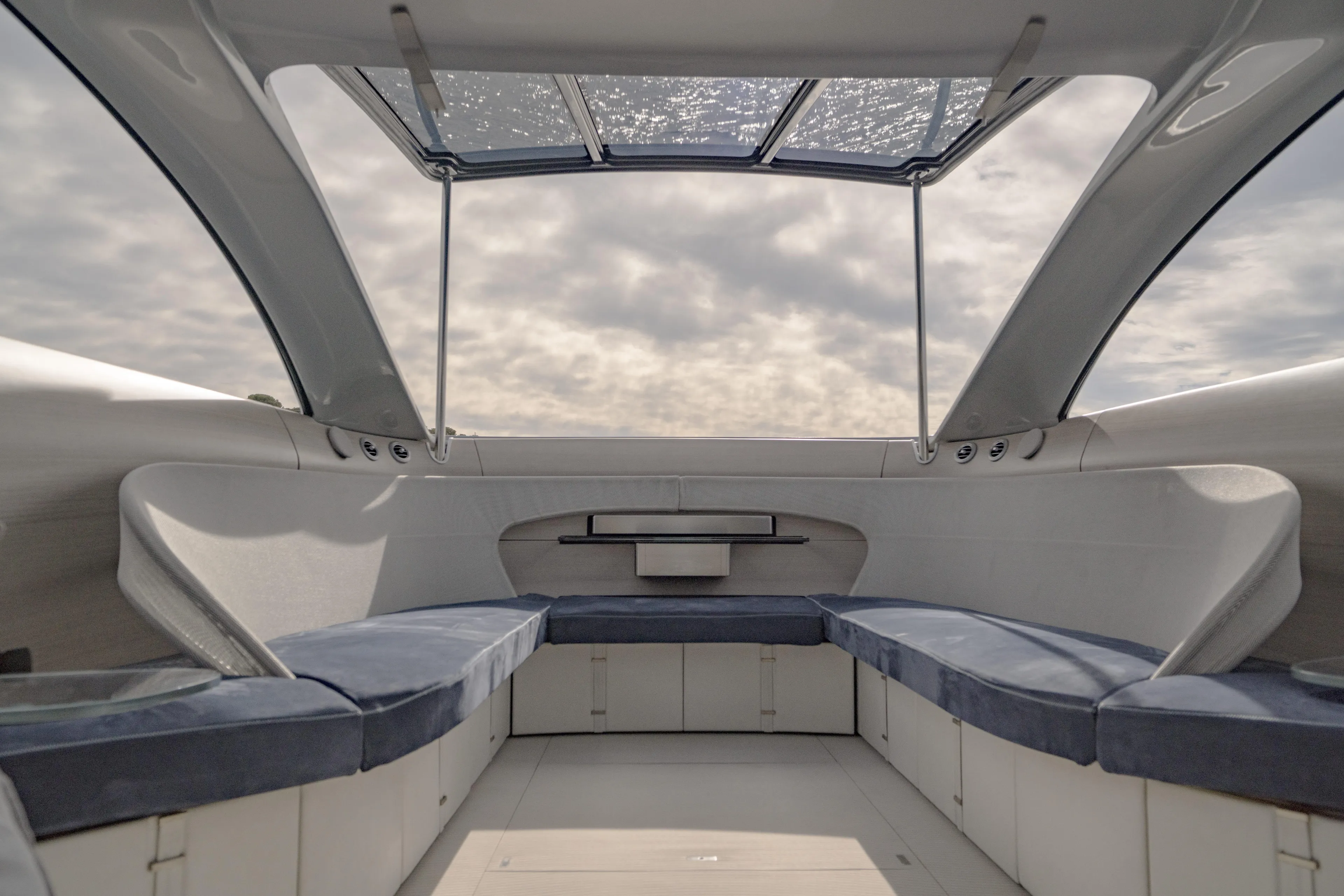 Mercedes Yacht Photos Pics Interior of 2022 Silver Arrows Marine Arrow 460 GT yacht with sleek seating and panoramic windows.