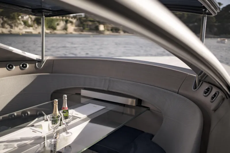 Mercedes Yacht Photos Pics Luxurious interior of 2022 Silver Arrows Marine Arrow 460 GT yacht with elegant dining setup.