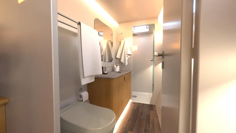  Yacht Photos Pics Modern bathroom in Ocean Renegade R5 MKII 2025 yacht, featuring sleek design and wooden accents.