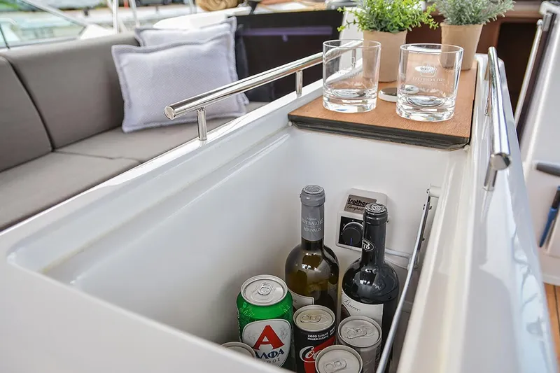  Yacht Photos Pics Built-in cooler on 2019 Dufour 460 Grand Large yacht with drinks and glasses.