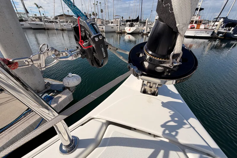 C'est Chic Yacht Photos Pics Bow of 2025 Jeanneau Sun Odyssey 350 sailboat docked in marina.