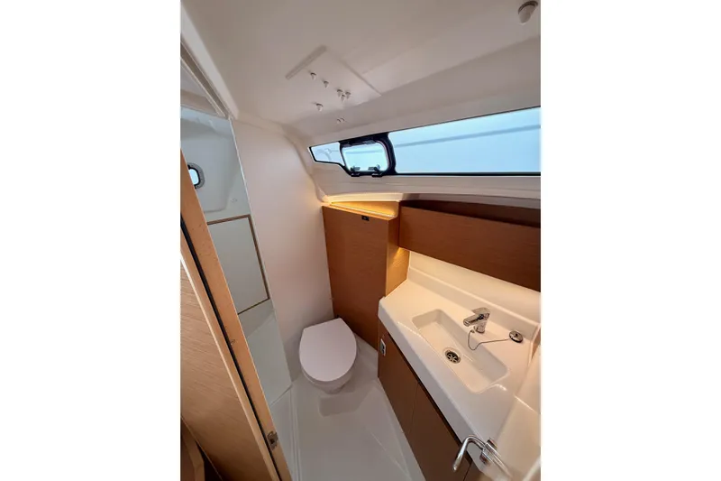 C'est Chic Yacht Photos Pics Modern bathroom interior of 2025 Jeanneau Sun Odyssey 350 yacht.