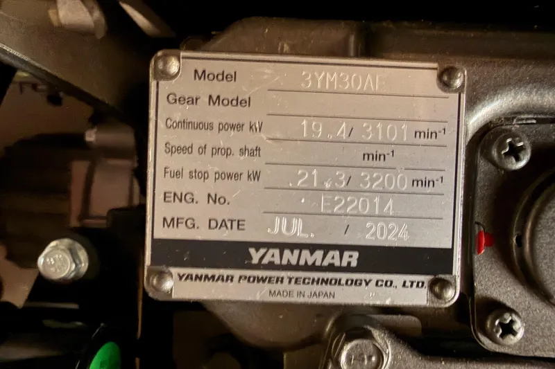 C'est Chic Yacht Photos Pics Yanmar engine plate on Jeanneau Sun Odyssey 350, manufactured July 2024, model 3YM30AE.