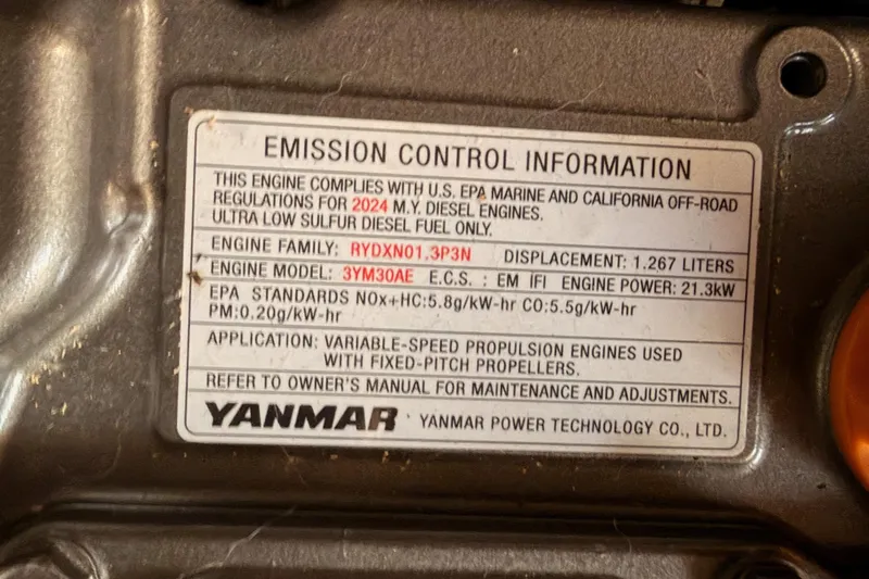 C'est Chic Yacht Photos Pics Emission control label on Yanmar engine for Jeanneau Sun Odyssey 350, 2025 model.