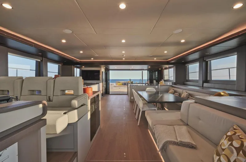  Yacht Photos Pics Luxurious interior of 2026 Silent 62 yacht with modern seating and ocean view.