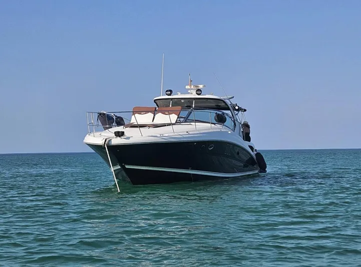 Marcello Yacht Photos Pics 2008 Sea Ray Sundancer yacht on calm blue ocean waters.