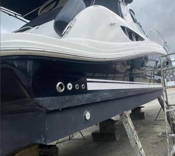 Marcello Yacht Photos Pics 2008 Sea Ray Sundancer yacht on dry dock, showcasing sleek hull design.