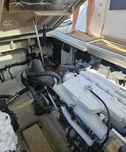 Marcello Yacht Photos Pics Engine compartment of a 2008 Sea Ray Sundancer boat with visible mechanical components.