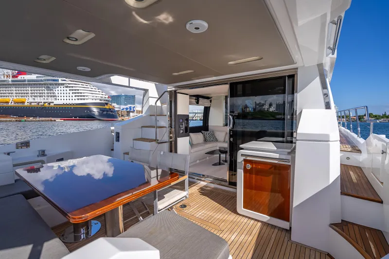  Yacht Photos Pics Luxurious 2019 Azimut 66 yacht interior with elegant seating and ocean view.