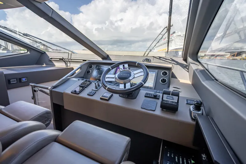  Yacht Photos Pics 2019 Azimut 66 yacht helm with modern controls and panoramic view.