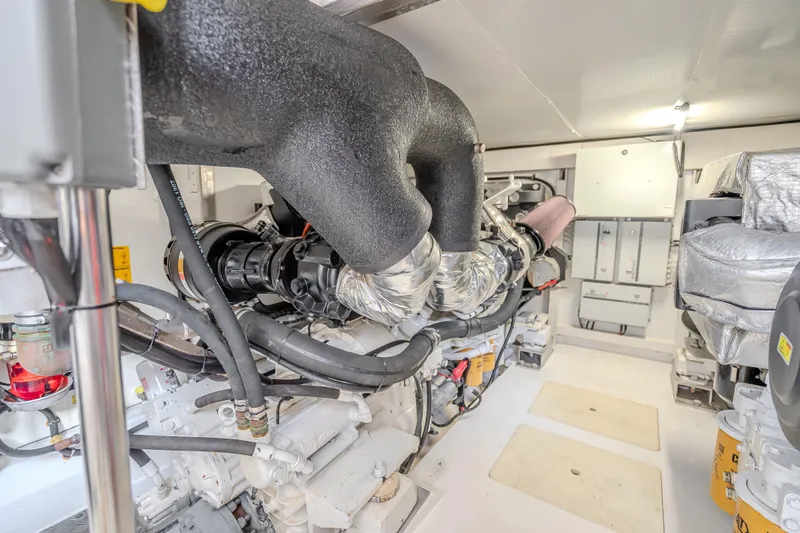  Yacht Photos Pics Engine room of 2019 Azimut 66 yacht, showcasing mechanical components and systems.