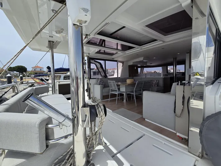 Catacha Yacht Photos Pics Luxurious Bali 4.6 catamaran interior, featuring spacious seating and dining area, 2022 model.