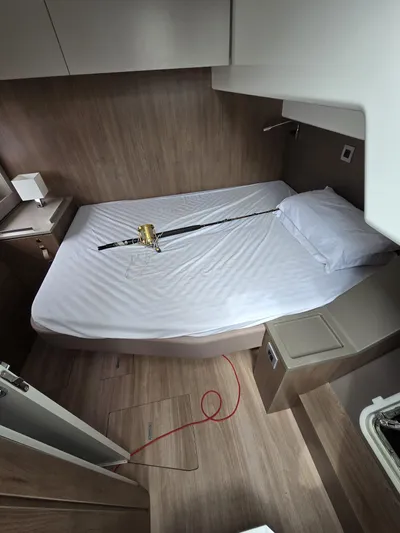 Catacha Yacht Photos Pics Cozy cabin interior of 2022 Bali 4.6 yacht with a neatly made bed.