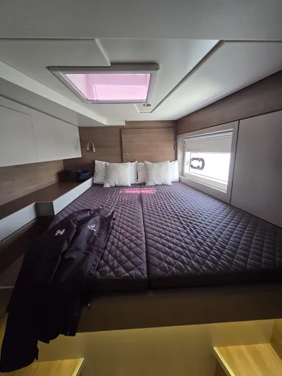 Catacha Yacht Photos Pics Cozy bedroom in 2022 Bali 4.6 yacht with quilted bedding and natural light.