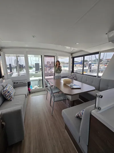 Catacha Yacht Photos Pics Interior of 2022 Bali 4.6 yacht with spacious seating and dining area.