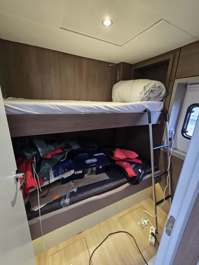 Catacha Yacht Photos Pics Bunk bed in 2022 Bali 4.6 yacht cabin with storage and life jackets.