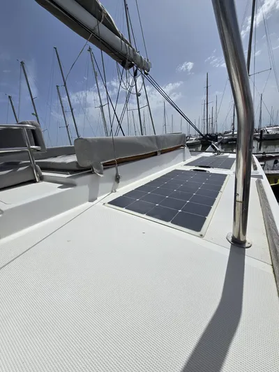 Catacha Yacht Photos Pics Sailboat deck with solar panel, Bali 4.6 model, 2022, under clear sky.