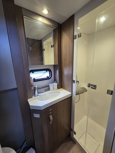 Catacha Yacht Photos Pics Modern bathroom in 2022 Bali 4.6 yacht with shower and vanity.