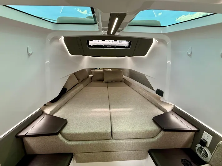 Good Vibes Yacht Photos Pics Luxurious interior of 2023 Axopar 37 Cross Cabin with skylights and modern design.