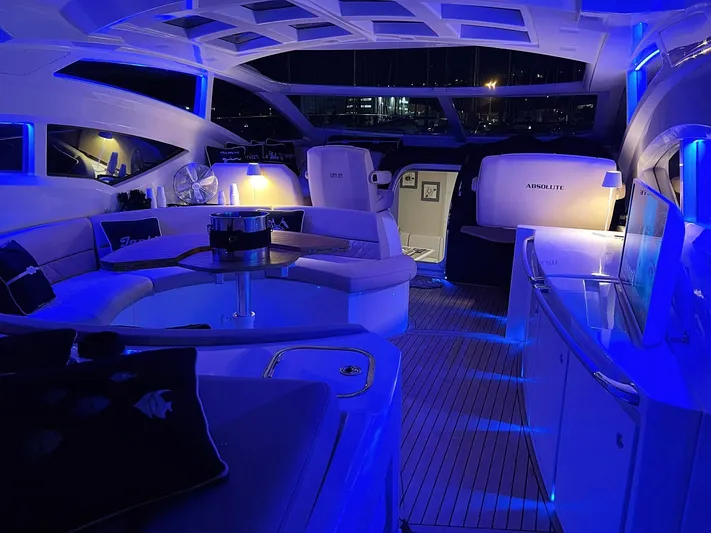  Yacht Photos Pics Luxurious 2008 Absolute 56 yacht interior with ambient blue lighting and modern furnishings.