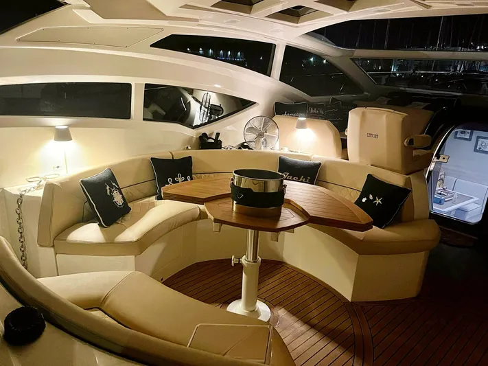  Yacht Photos Pics Luxurious interior of 2008 Absolute 56 yacht with elegant seating and ambient lighting.