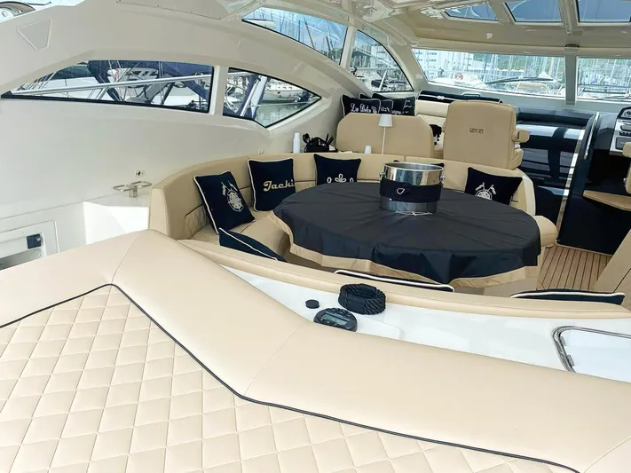  Yacht Photos Pics Luxurious interior of a 2008 Absolute 56 yacht with beige seating and elegant decor.