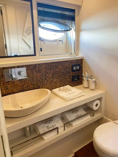  Yacht Photos Pics Luxurious bathroom on 2008 Absolute 56 yacht with modern sink and elegant decor.