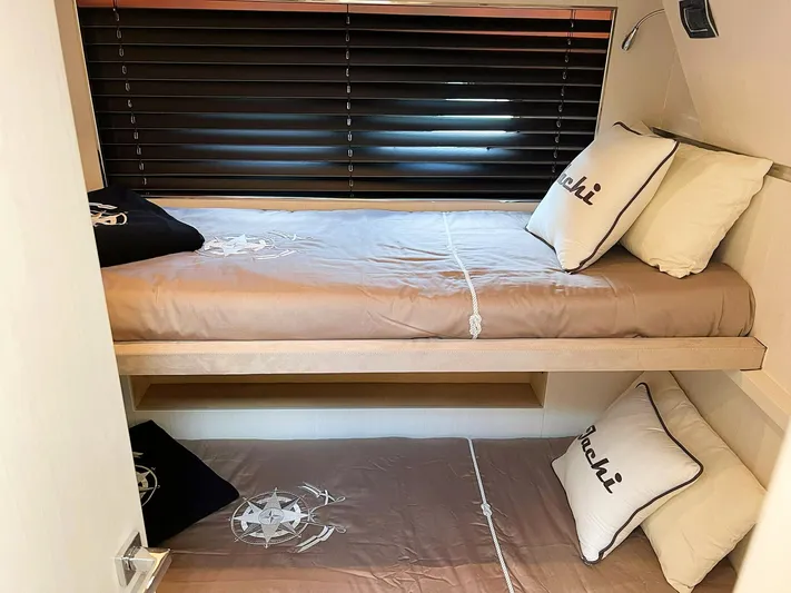  Yacht Photos Pics Bunk beds in a 2008 Absolute 56 yacht cabin with pillows and blinds.