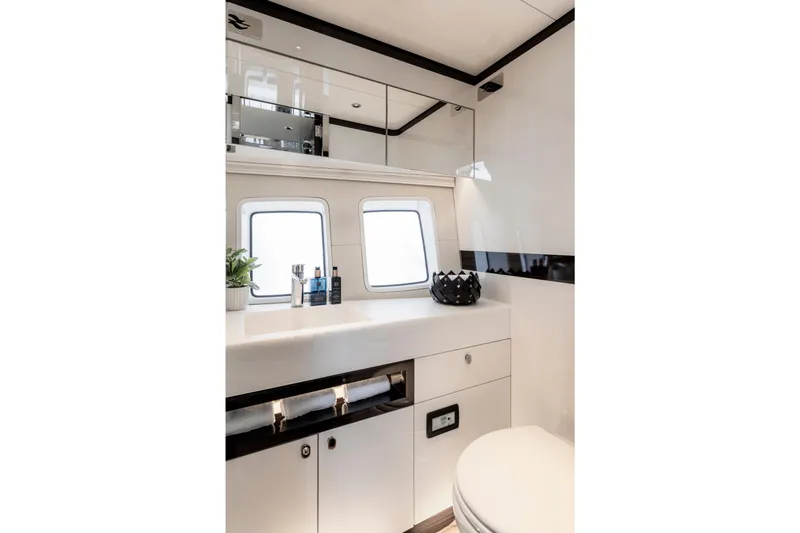 Baateaux Yacht Photos Pics Luxurious bathroom interior of 2024 Zeelander 5 yacht, featuring sleek design and modern amenities.