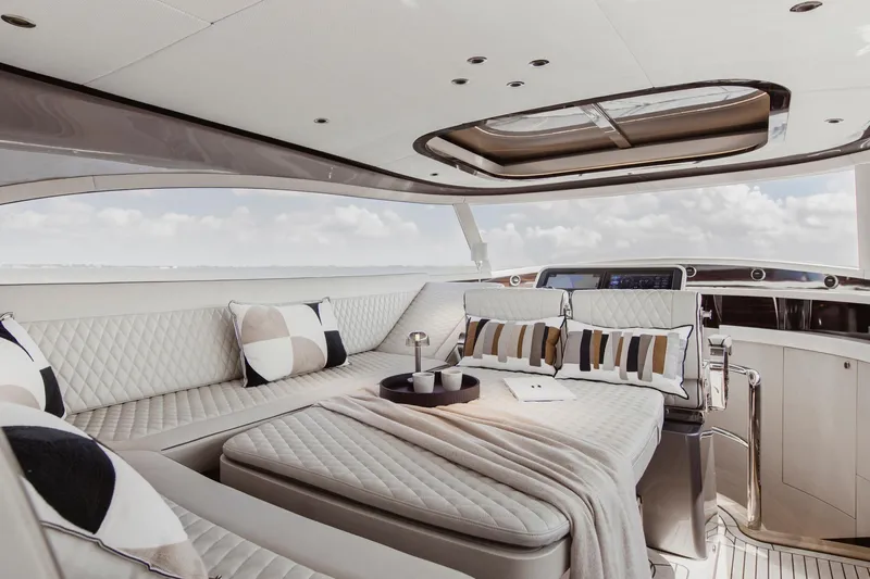 Baateaux Yacht Photos Pics Luxurious interior of 2024 Zeelander 5 yacht with elegant seating and panoramic views.