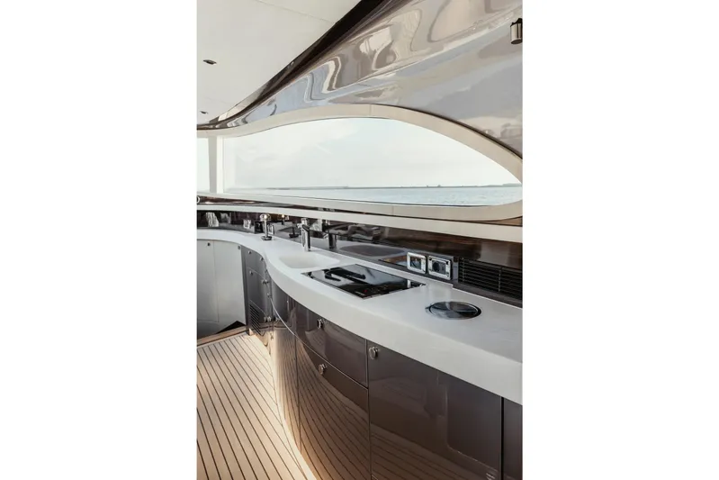 Baateaux Yacht Photos Pics Luxurious 2024 Zeelander 5 yacht interior with sleek kitchen design and ocean view.