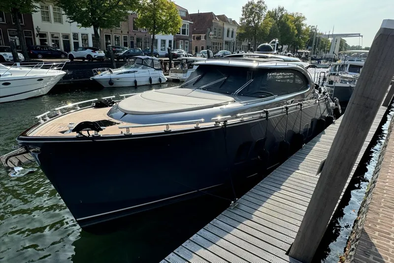 Baateaux Yacht Photos Pics 2024 Zeelander 5 yacht docked in a scenic marina setting.