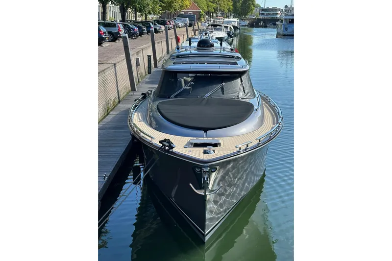 Baateaux Yacht Photos Pics 2024 Zeelander 5 yacht docked in a serene marina setting.